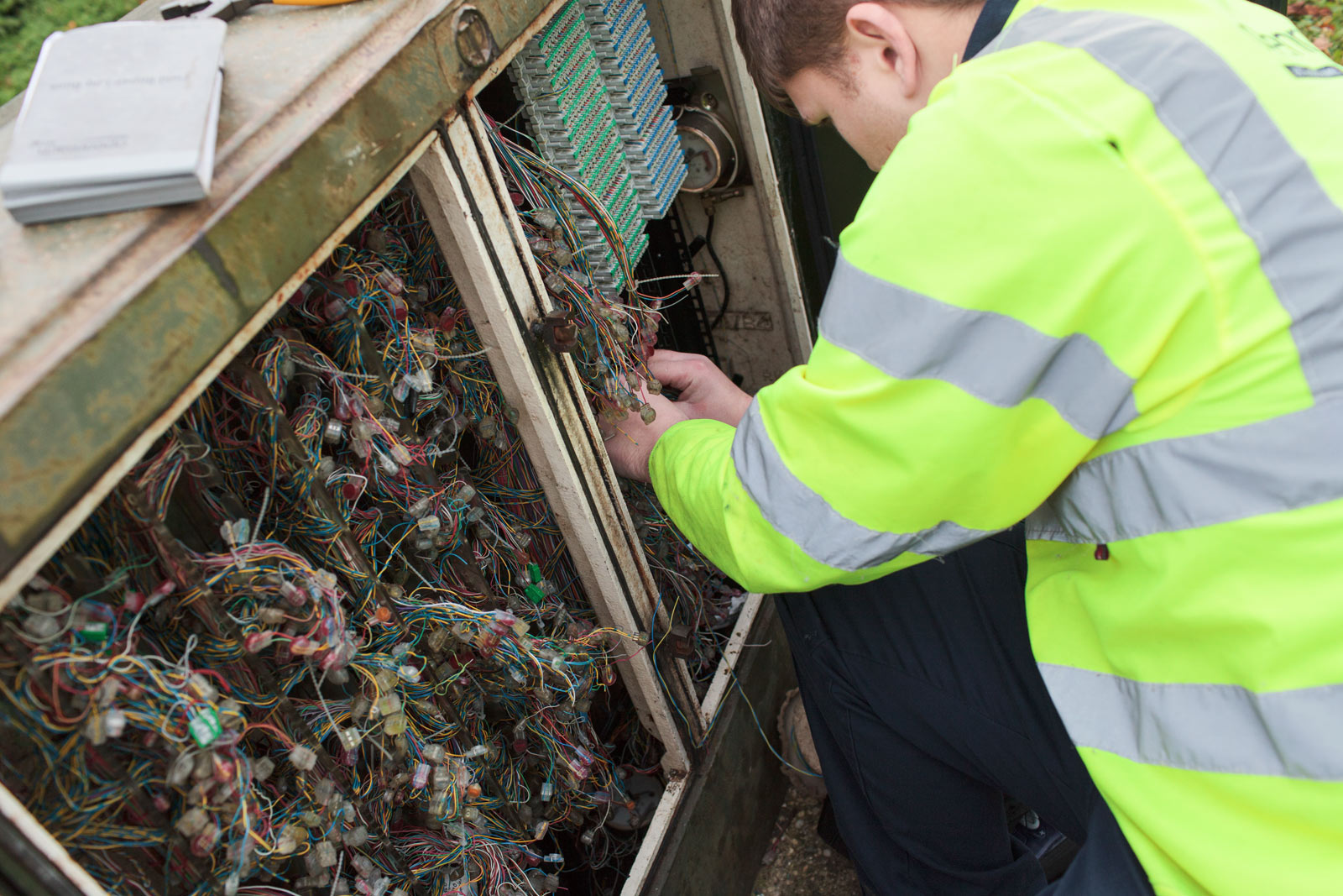 Engineer fixing a broadband fault